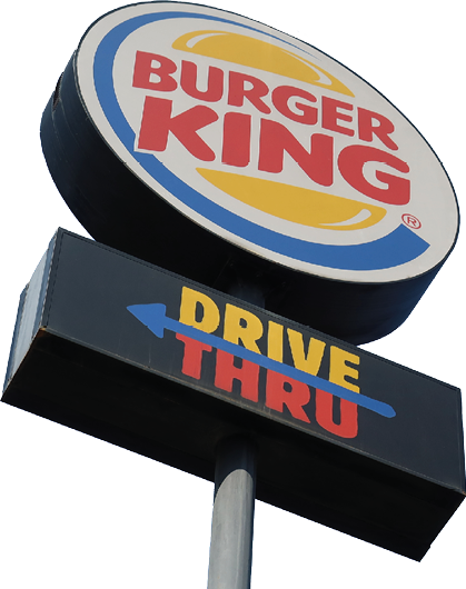 PAKKRET, NONTHABURI, THAILAND - JANUARY 1, 2021: A Burger King sign indicates a  Drive Thru  on January 1, 2021 in Pakkret, Nonthaburi, Thailand