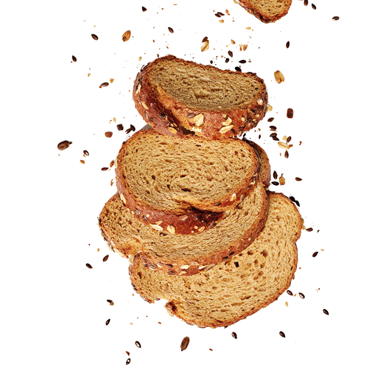 A loaf of sliced bread with oats and flax seeds