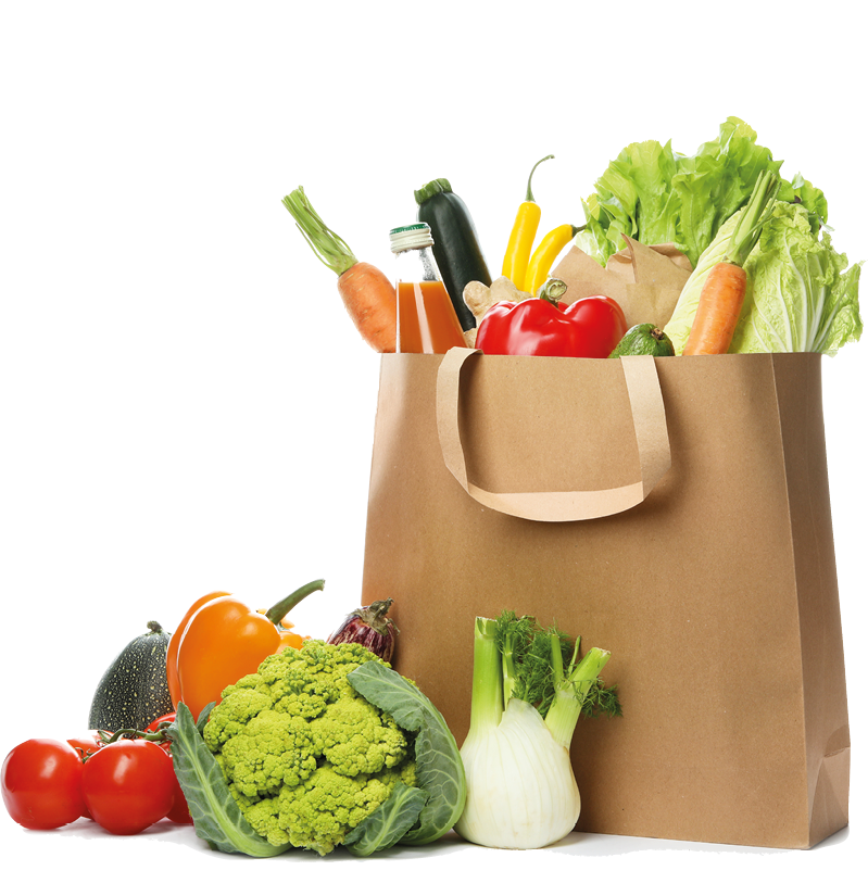 Paper bag with fresh vegetables and bottle of juice on white background