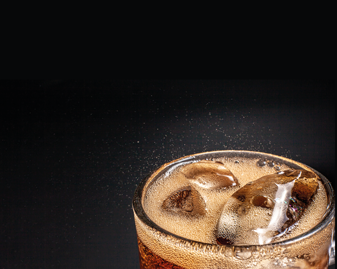 Fizz sparkling Cola water Refreshing bubbly Soda Pop with Ice Cubes  Cold soft drink cola carbonated liquid fresh and cool iced drink in a glasses   Refreshing and quench thirst concept  