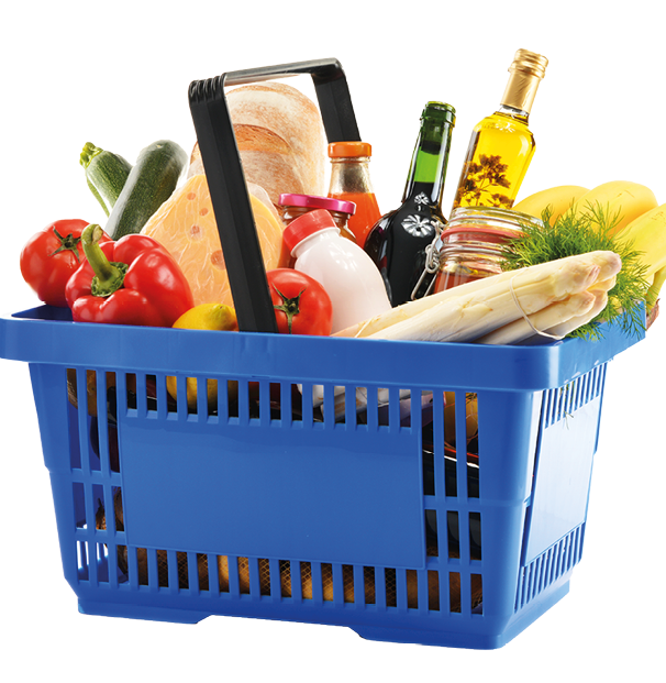 Plastic shopping basket with variety of grocery products isolated on white