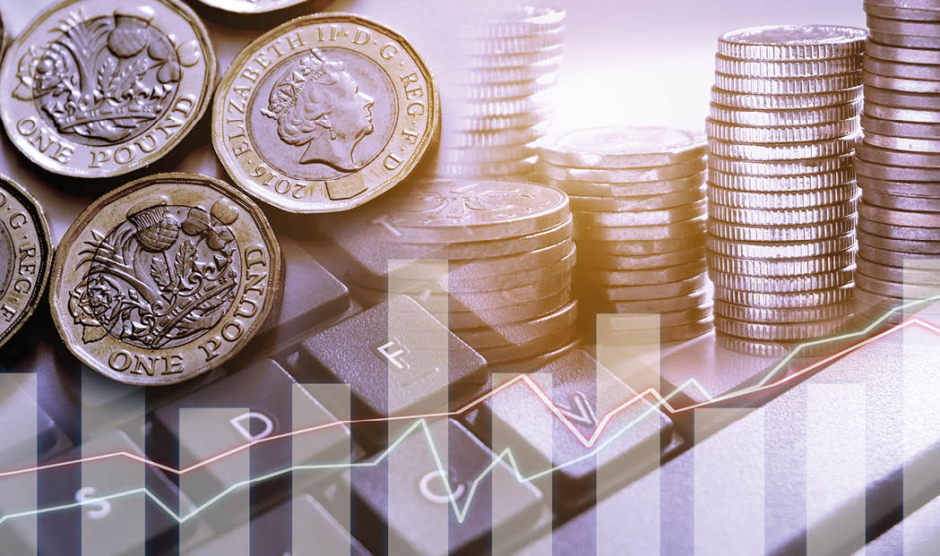 Double exposure of graph and row of coins and new pound couins for finance and banking concept