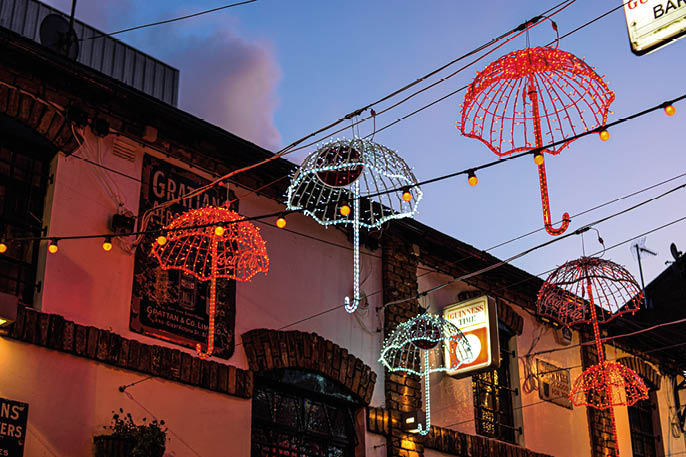 Belfast, UK   January 23rd 2019: Photo of the Umbrella street in Belfast at night during Christmas time