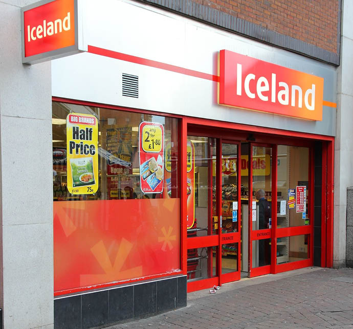 LIVERPOOL, UK - APRIL 20, 2013: People shop in Iceland store on April 20, 2013 in Liverpool, UK  The frozen foods company has 814 stores in the UK with 1 8% share of country's food market 