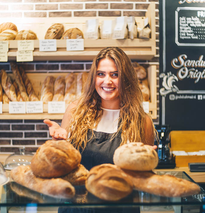 Woman sells in bakery 