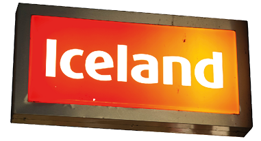 Rushden, Northamptonshire, United Kingdom - 15 November 2019 - The exterior of an Iceland supermarket  Corby shopping centre night street view 