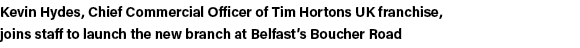 Kevin Hydes, Chief Commercial Officer of Tim Hortons UK franchise, joins staff to launch the new branch at Belfast s    