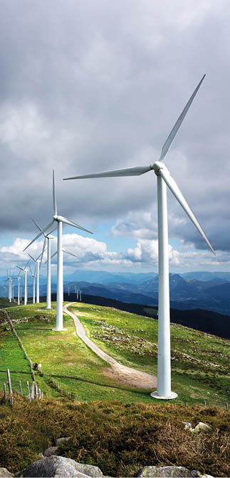 windmill farm in mountain with beautiful light