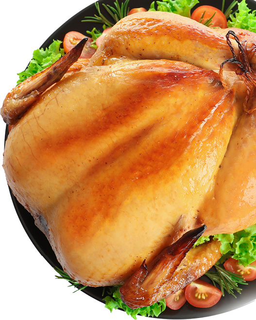 Platter of cooked turkey with garnish on white background, top view