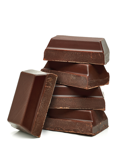 Broken milk chocolate bars stack isolated on white background