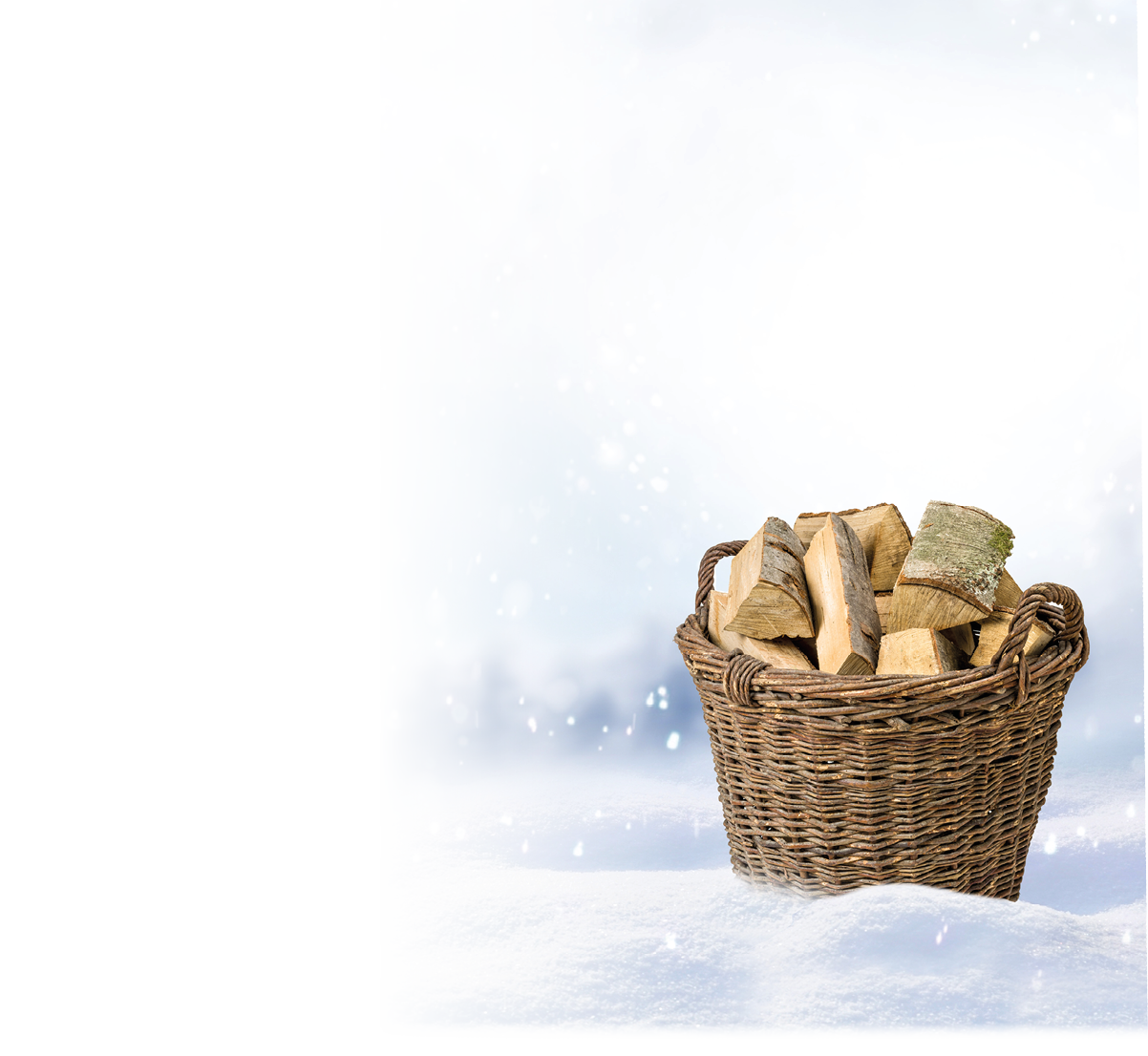 Beautiful winter background of snow and blurred forest in background, Gently falling snow flakes against blue sky, free space for your decoration  for your decorations  Wide panorama format 