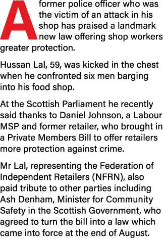 A former police officer who was the victim of an attack in his shop has praised a landmark new law offering shop work   