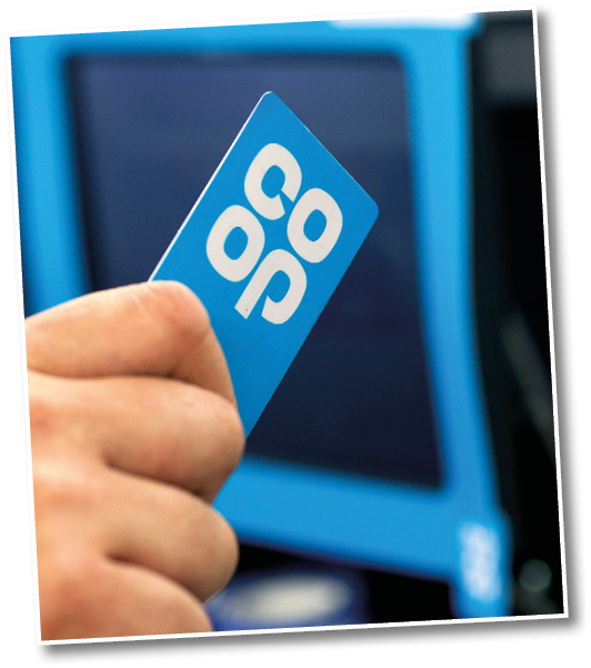 Co Op membership card at Malvern with store manager Matt Baker ( holding cards ) 