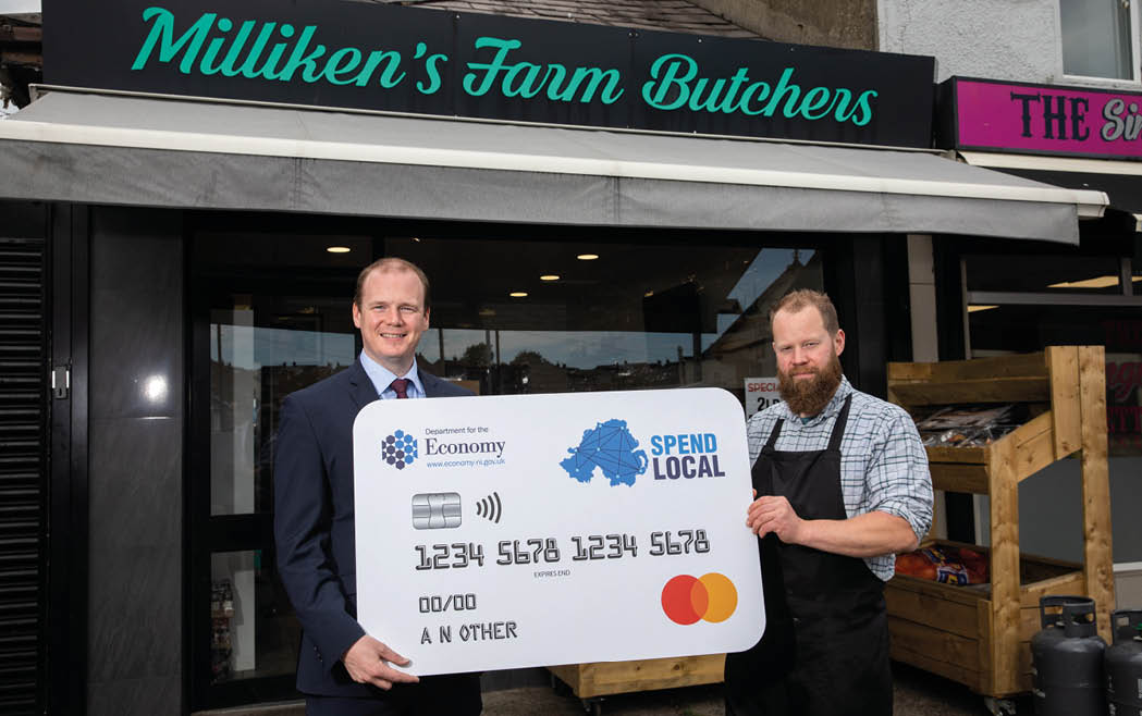 Economy Minister Gordon Lyons with Andrew Milliken of Milliken's Farm Butchers in Bangor  Registration for the High Street Scheme Spend Local card will be open from 27 September until 25 October 