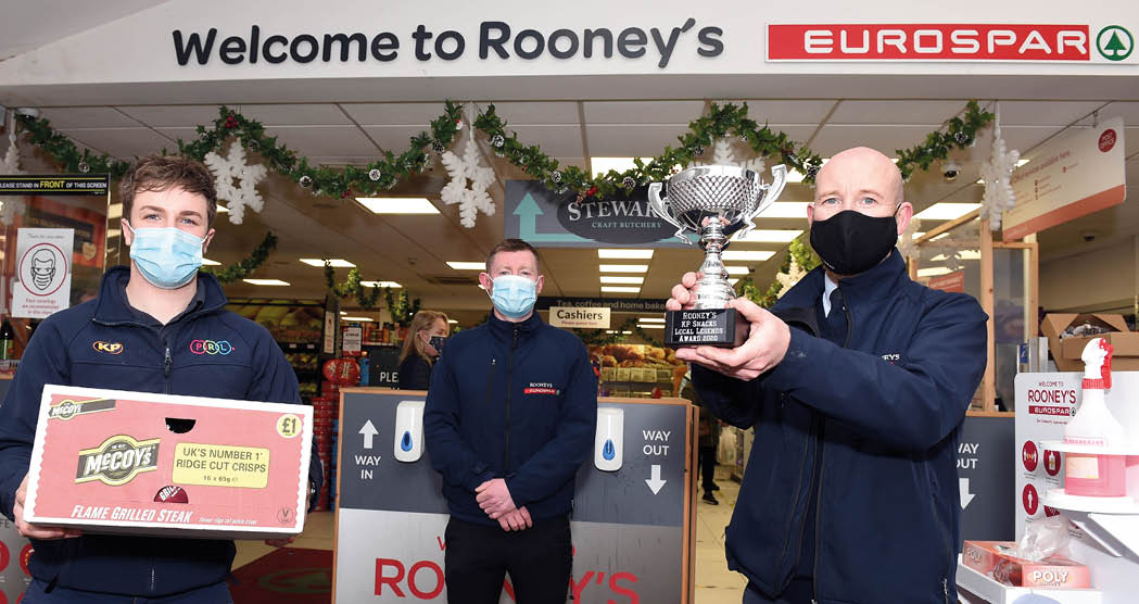 Sam Gordon from KP Snacks with James and Timmy Rooney from Rooney's EUROSPAR, Enniskillen, Co Fermanagh