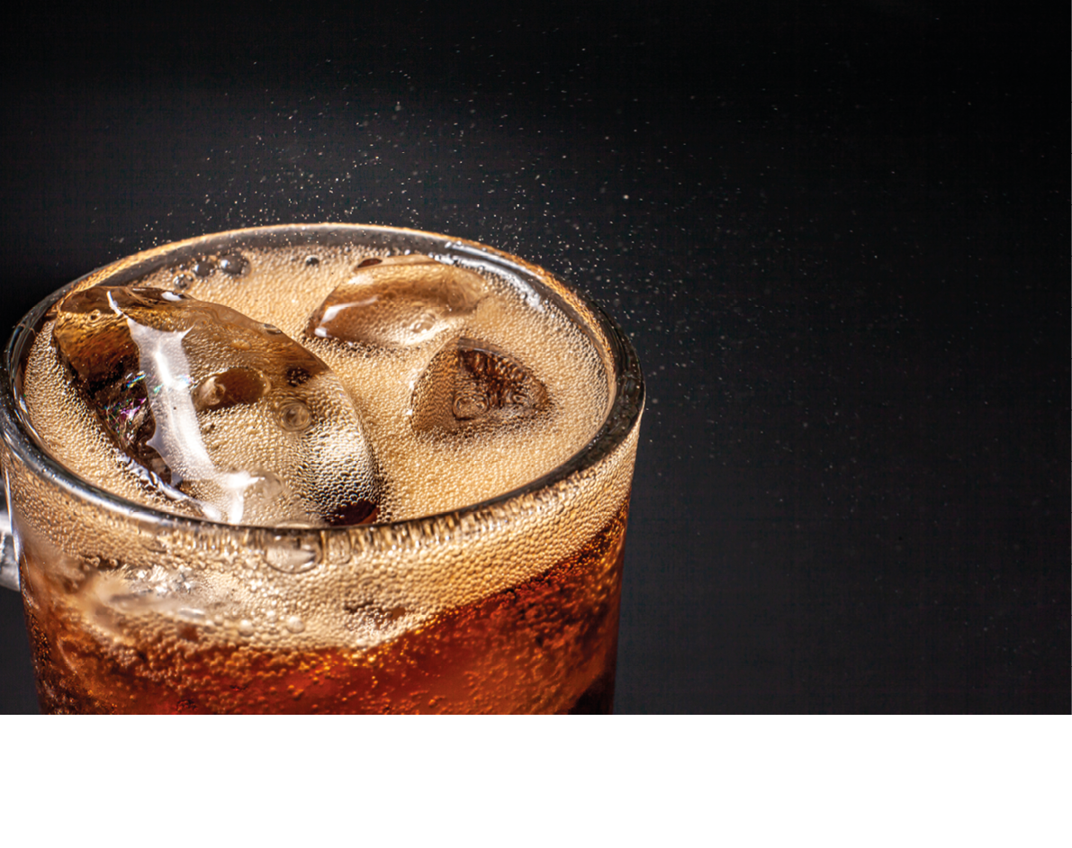 Fizz sparkling Cola water Refreshing bubbly Soda Pop with Ice Cubes. Cold soft drink cola carbonated liquid fresh and cool iced drink in a glasses . Refreshing and quench thirst concept .