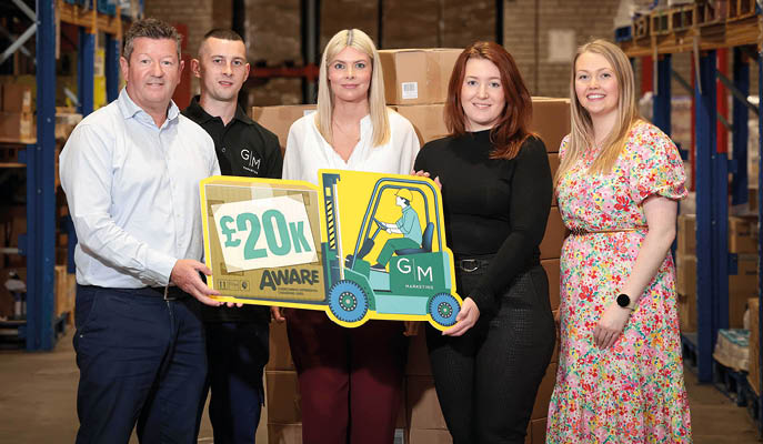 Leading Belfast-based distribution company, GM Marketing has announced its aim to raise £20,000 for AWARE, the depression charity for Northern Ireland. Pictured at the launch is (l to r) Gerard McAdorey, Managing Director, GM Marketing, Rhys Mahood, Warehouse Operative, GM Marketing, Anna Mulgrew, Human Resources, GM Marketing, Natasha Mackay, Corporate Partnership Officer, AWARE and Kaitlyn Martin, Brand Manager, GM Marketing. Visit www.gmmarketing.co.uk or call +44 (0)28 9026 7080 for more information. 