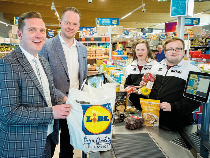Top employer Lidl Northern Ireland and leading social enterprise NOW Group today launched a pioneering employability programme – the first of its kind with the supermarket retailer - to support people with learning difficulties and autism into a retail career. The newly launched Open College Network Northern Ireland (OCN NI) approved Retail Skills Academy with Lidl Northern Ireland will support NOW Group participants in “host” stores across the region, to gain new skills and on-the-job training with Northern Ireland’s fastest-growing supermarket retailer. Pictured (left to right) are; Sean Hanna, Director of Services at NOW Group; Conor Boyle, Regional Managing Director at Lidl Northern Ireland; and NOW Group Ambassadors Tara Andrews and Matthew Gray.