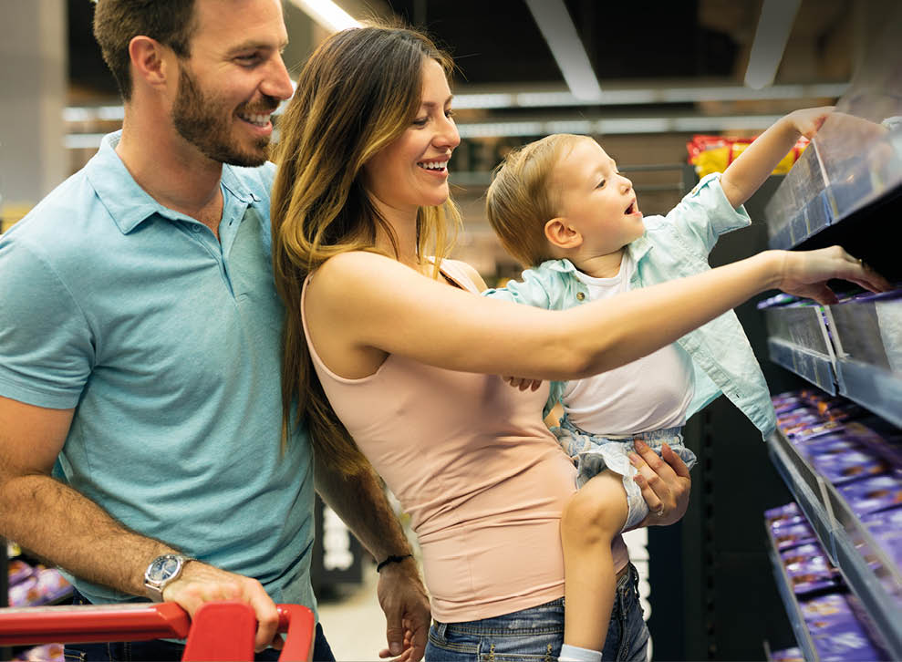 Family shopping in their local supermarket.
