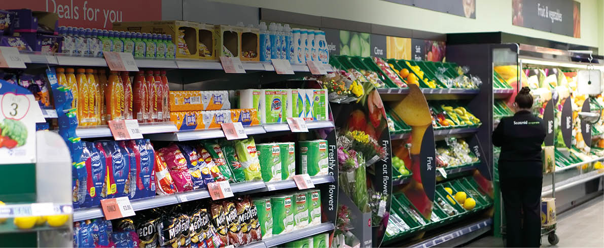 WEST CALDER, SCOTLAND, UK - AUGUST 24, 2017. A supermarket food aisle at Scotmid Co-operative supermarket.