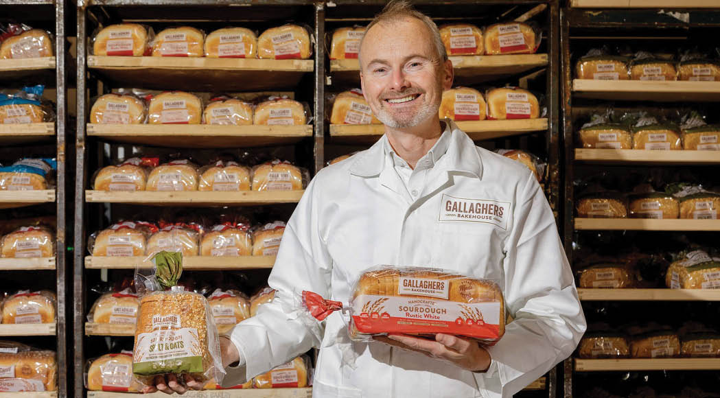 Repro Free by James Connolly: Gallagher s Bakery CEO, Patrick O Sullivan, checks out the first batch of the new Gallagher s Bakehouse range before it is dispatched  Gallagher s is looking to shake-up the packaged bread sector industry with the launch of an innovative range of everyday handcrafted sourdough bread products  The 52-year-old business is changing its brand positioning and offering in line with consumer demand for tastier, more nutritious products which contribute to a healthier lifestyle  The new products deliver on health benefits   such as being a good source of high in fibre which is good for gut health  with one of the products high in Vitamin D3  which is important for building and keeping strong bones  Sourdough is generally rich in prebiotics, which complement good gut health and enhance the body s ability to absorb vitamins and minerals 