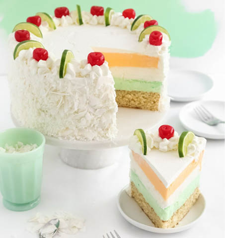 Coconut sherbet cake with slice removed