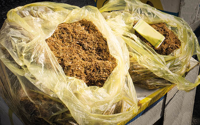 The illegal trade of contraband tobacco on the street market in Konjic, Bosnia and Herzegovina