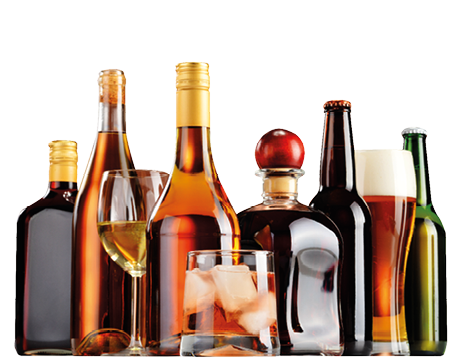 Bottles and glasses of assorted alcoholic beverages.