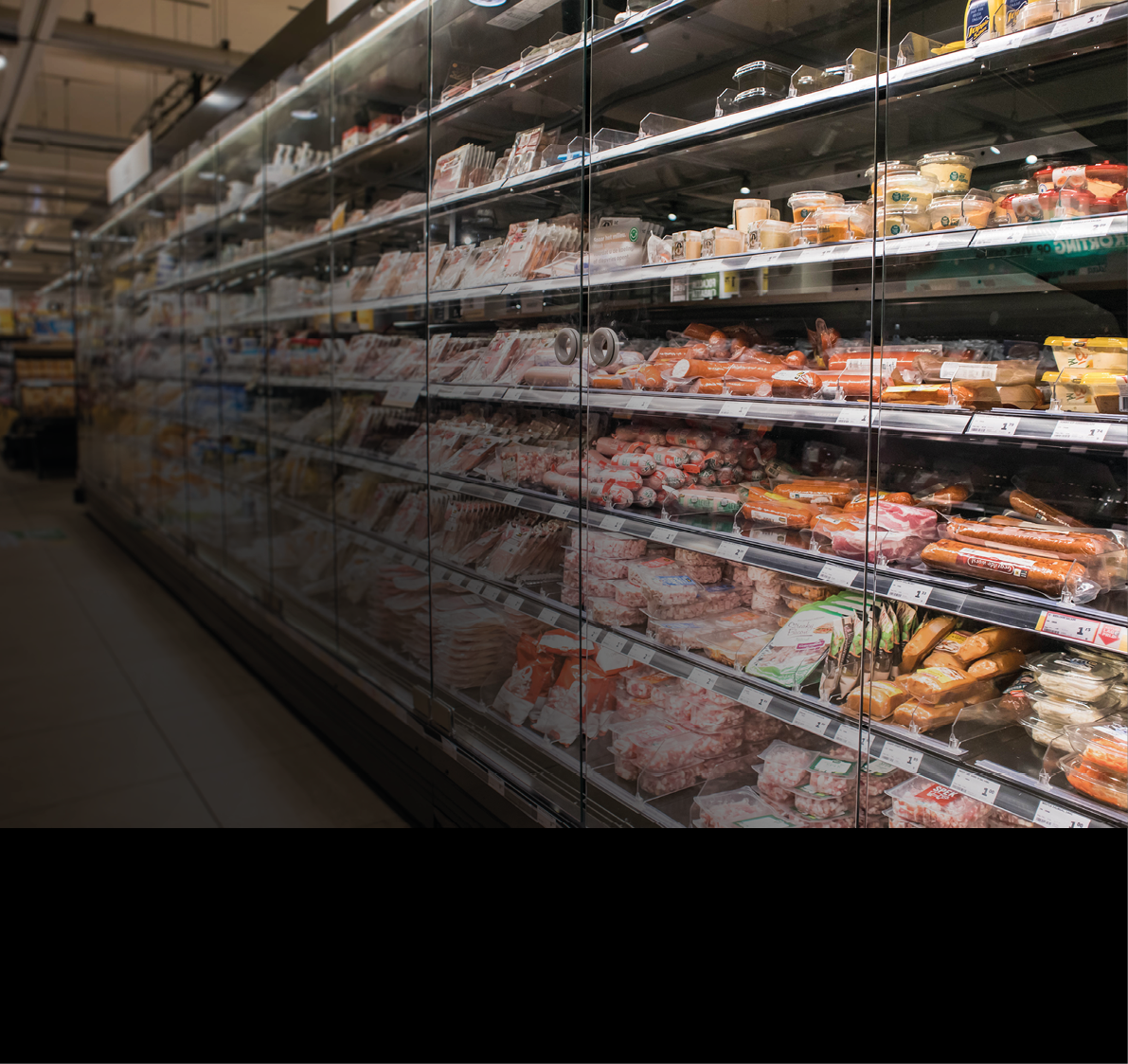 Rotterdan / Netherlands - September 15, 2019 : Rows of fresh chilled food in a chiller cabinate in a food shop.