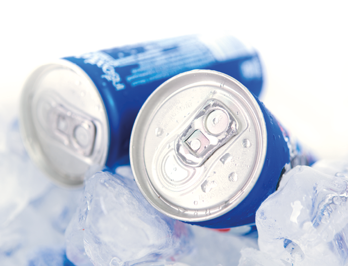 Soda cans in ice with condensation - drink can