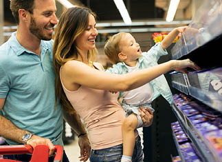 Family shopping in their local supermarket.