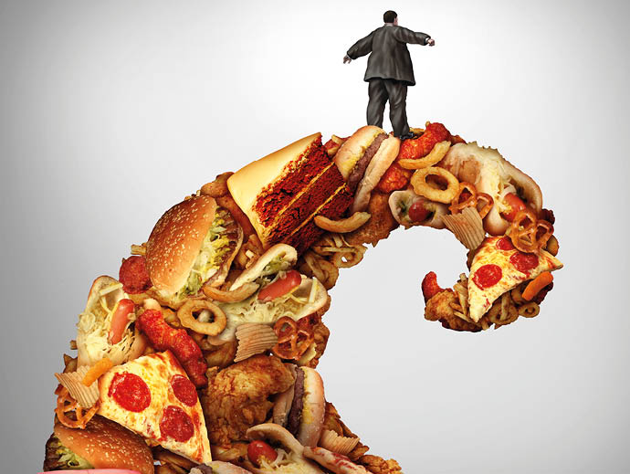 Obesity health risk as a fat person losing control riding a Junk food wave as a medical nutrition metaphor for the danger of unhealthy eating of fatty food or high sugar sweets 