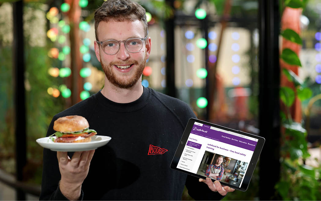 safefood is encouraging small food businesses in Northern Ireland to benefit from its free food safety e-learning tool - 'safefood for business’ - as new research shows that nearly two-thirds (64%) of local food enterprises have extreme concerns with the consequences of food safety breaches. Pictured using the 'safefood for business’ free food safety e-learning tool is Steven Orr from Bodega Bagels. 