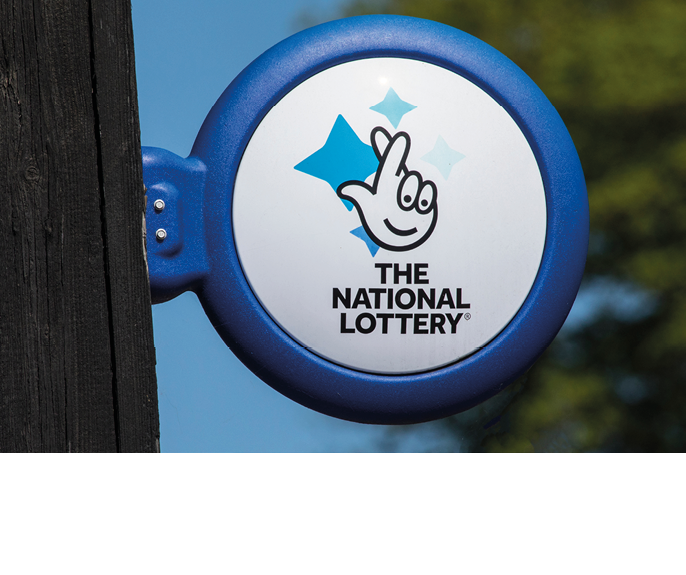ARUNDEL, UK - May 5th 2018: Close-up of The National lottery Sign, on display outside a newsagents in the town of Arundel in West Sussex, on 5th May 2018.