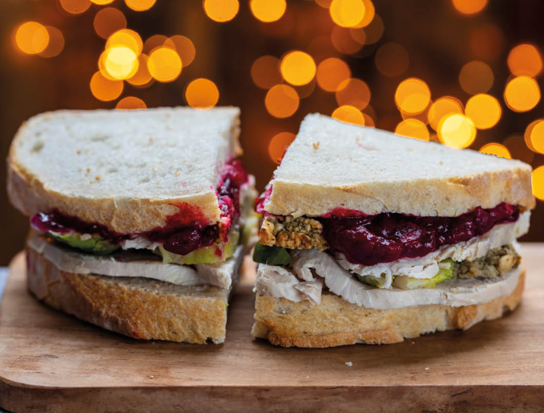 Leftovers Christmas sandwich with turkey, stuffing and cranberry sauce