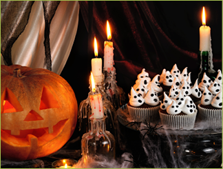 Chocolate muffin meringues with meringues on the table in honor of Halloween