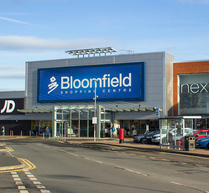 19 February 2018 Various retail shop fronts at the modern Bloomfield Shopping Centre in Bangor Northern Ireland on a quiet Monday after a busy weekend