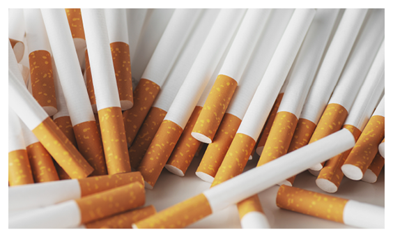 Close up of a smoking cigarettes . cigarette filter tubes