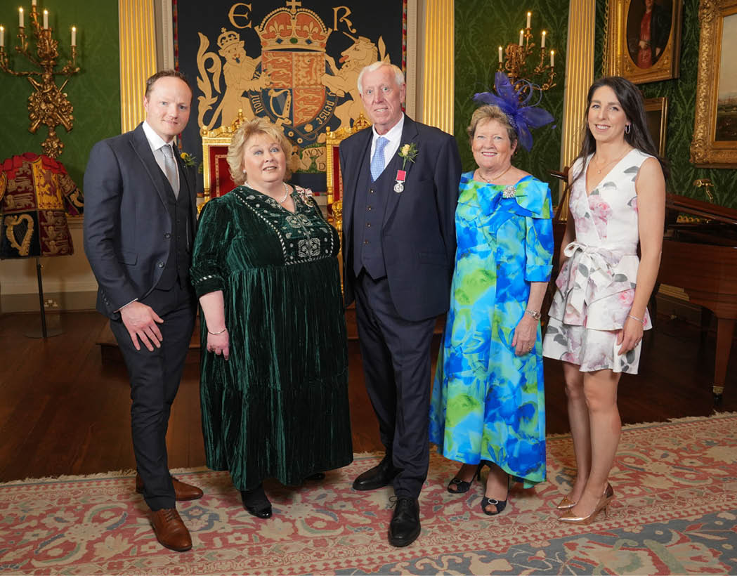 Robin Mercer BEM is pictured with Lord Lieutenant Dame Fionnuala Jay-O'Boyle DBE, at a ceremony in Hillsborough Castle, where he was presented with the British Empire Medal. He is joined by his wife Edith, son Alan and his wife Ciara. www.hillmount.co.uk