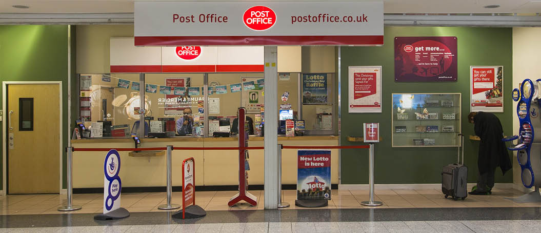 LONDON - DECEMBER 15: A UK Post Office December 15, 2013, London, England. It now operates independently of Royal Mail. Revenue decreased by 3.5% to £583 million in the 6 months to 29 September 2013.