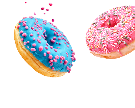 Fresh sweet donuts in motion with multicolored fruit glaze and sprinkles decorated. Fast sweet food concept, bakery ad design elements with glazed frosted falling doughnuts isolated, white background