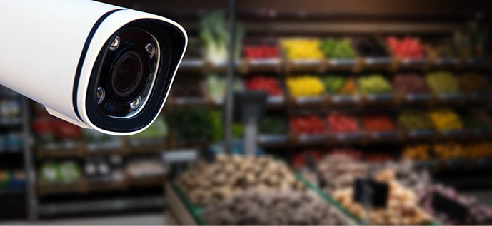 CCTV camera system security in shopping mall supermarket blur background.