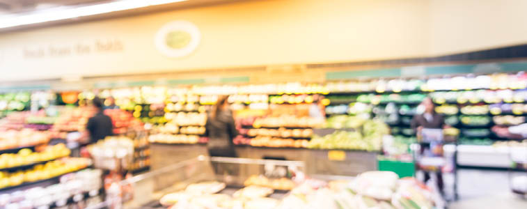 Vintage tone blurred background image customer shopping at local grocery store in San Francisco. Fresh fruits and vegetables on display. Organic, locally grown produces, healthy food in supermarket