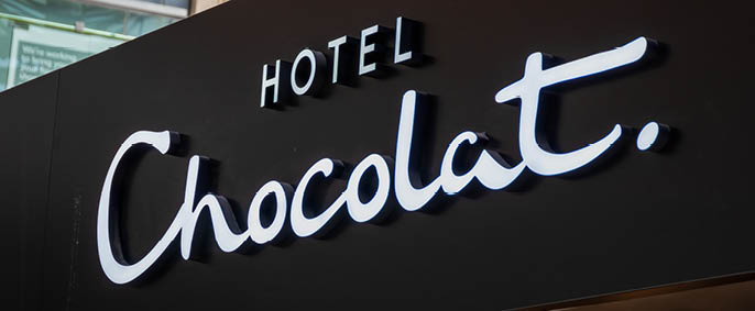 London, UK August 10 2022 - Looking up at a Hotel Chocolat logo in London ,United Kingdom