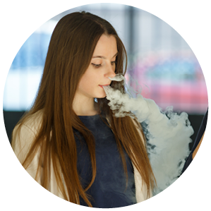 Vape teenagers. Two young cute girls in casual clothes smoke electronic cigarettes outdoors in the street in summer day. Bad habit that is harmful to health. Vaping activity.