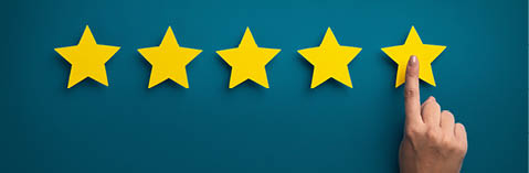 Customer Experience Concept. Woman hand showing on five star excellent rating on background, copy space