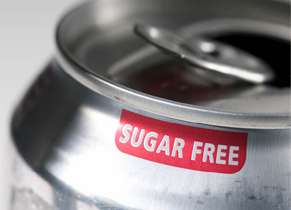 The phrase Sugar Free printed in red on a soft drink can