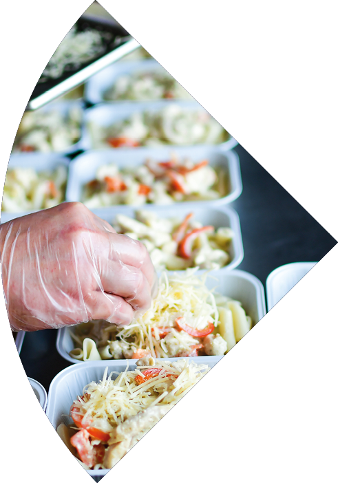 takeaway chicken salad with vegetables and cheese food delivery. preparing portions in containers. service food order online delivery in quarantine covid-19. airline food. airline meals and snacks