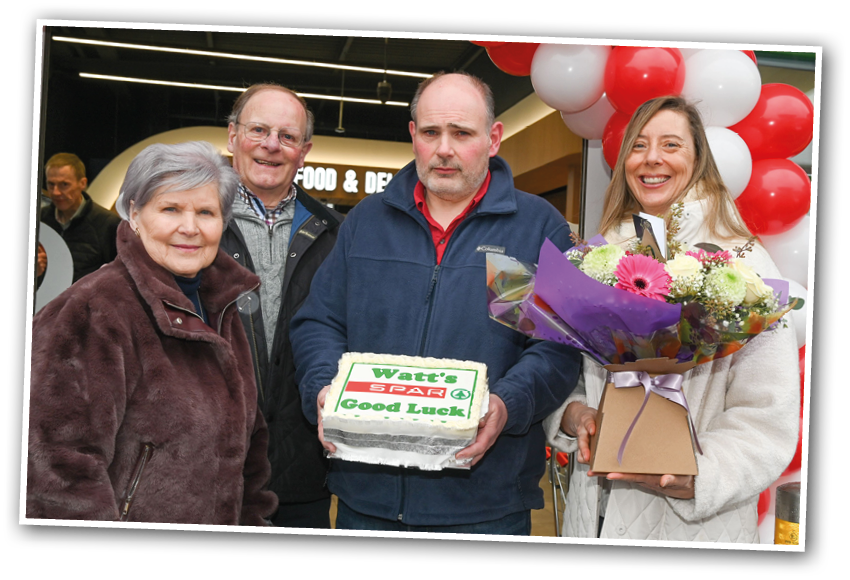 A group of people are standing in front of a deli, holding a cake. AI generated content