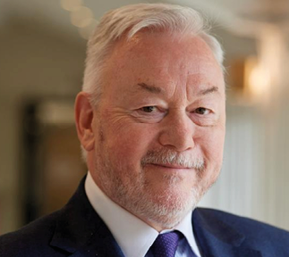 A man with a white beard and mustache is wearing a suit and tie. AI generated content